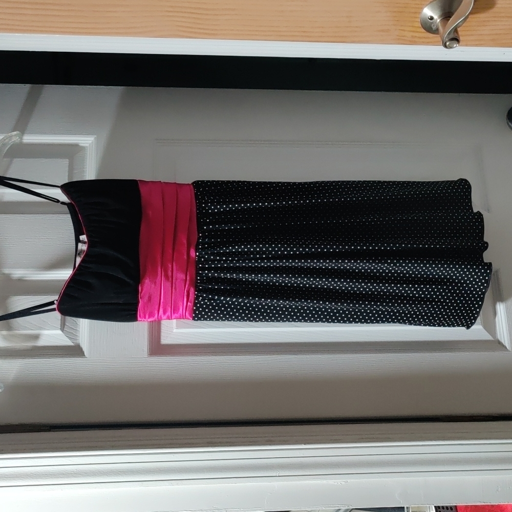 NWT- Trixxi size med (juniors) pink and black poke-a-dot dress with tie back.